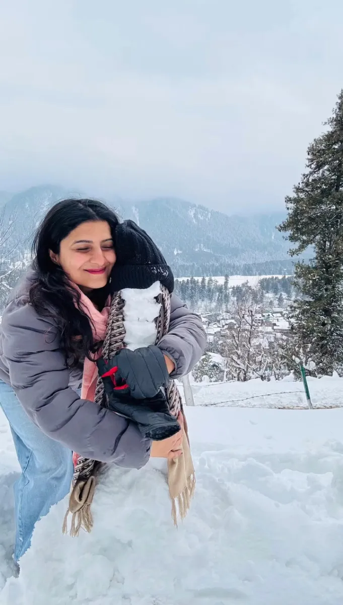 Posing with snowman at Gulmarg, Kashmir